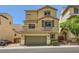 Charming three-story home with a two-car garage, balcony and well-maintained landscaping at 10725 Wrigley Field Ave, Las Vegas, NV 89166