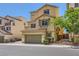 Charming three-story home with a two-car garage and well-maintained landscaping at 10725 Wrigley Field Ave, Las Vegas, NV 89166
