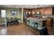 Spacious kitchen featuring an island, stainless steel appliances, and adjacent dining area at 10725 Wrigley Field Ave, Las Vegas, NV 89166