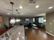 Spacious living area featuring an open concept layout, perfect for entertaining at 10725 Wrigley Field Ave, Las Vegas, NV 89166