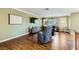 Spacious living room featuring hardwood floors, comfortable seating, and a modern entertainment setup at 10725 Wrigley Field Ave, Las Vegas, NV 89166