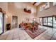 Inviting lobby with soaring ceilings, tile floors, elegant decor, and an abundance of natural light at 10725 Wrigley Field Ave, Las Vegas, NV 89166