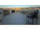 Rooftop deck featuring lounge seating, a table, and an outdoor fireplace at 10725 Wrigley Field Ave, Las Vegas, NV 89166