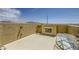 Rooftop deck with an outdoor fireplace, seating area, and scenic views, creating an ideal space for outdoor living at 10725 Wrigley Field Ave, Las Vegas, NV 89166