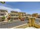 Residential street view showcasing well-maintained homes with desert landscaping and mountain views in the background at 10725 Wrigley Field Ave, Las Vegas, NV 89166