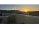 A breathtaking sunset view overlooking neighborhood rooftops at 10725 Wrigley Field Ave, Las Vegas, NV 89166