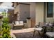 Cozy patio space with brick pavers, seating, plants, and elegant decor perfect for outdoor relaxation at 12495 Point Sierra St, Las Vegas, NV 89138