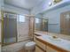 Bathroom with shower-tub combination, gold trim and vanity at 1409 Santa Margarita St # G, Las Vegas, NV 89146