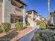 Beautiful building exterior and landscaped walkway at 1409 Santa Margarita St # G, Las Vegas, NV 89146