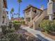 Attractive two-story condo building with stairs, stucco siding and desert landscaping at 1409 Santa Margarita St # G, Las Vegas, NV 89146