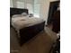 Primary bedroom featuring a large bed, neutral walls, and a walk-in closet for ample storage at 1618 Dakota Group Ave, North Las Vegas, NV 89084
