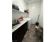 Convenient laundry room with modern appliances, ample counter space, and storage solutions at 1618 Dakota Group Ave, North Las Vegas, NV 89084