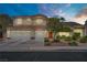 Stunning two-story home featuring a three-car garage and a meticulously landscaped front yard at 2010 Catalina Marie Ave, Henderson, NV 89074
