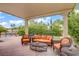 Covered patio with comfortable seating, perfect for outdoor entertaining and relaxation by the pool at 2010 Catalina Marie Ave, Henderson, NV 89074