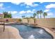 Backyard pool with waterfall feature, spa, and lush landscaping for a resort-like experience at 2010 Catalina Marie Ave, Henderson, NV 89074
