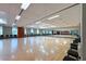 Spacious ballroom with wood floors, full mirrors, and ample windows for natural light at 2154 Idaho Falls Dr, Henderson, NV 89044