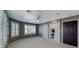 Bright bedroom with windows, a ceiling fan, and built-in cabinets, creating a flexible, functional space at 2154 Idaho Falls Dr, Henderson, NV 89044