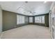 Well-lit bedroom with multiple windows, a ceiling fan, and built-in shelving, creating a comfortable space at 2154 Idaho Falls Dr, Henderson, NV 89044