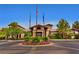 Community clubhouse featuring manicured grounds, flowers, and an inviting entrance at 2154 Idaho Falls Dr, Henderson, NV 89044