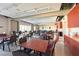 Large community dining area perfect for gatherings, with tables, chairs, and a counter with cabinets at 2154 Idaho Falls Dr, Henderson, NV 89044
