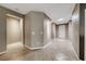 Spacious hallway with tile flooring and neutral paint, leading to other areas at 2154 Idaho Falls Dr, Henderson, NV 89044