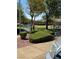 Well maintained community common area with seating, mature trees and manicured landscaping at 252 Quail Ranch Dr, Henderson, NV 89015