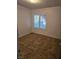 Cozy bedroom with natural light, large window, and stylish tile flooring at 308 Sunbeam Dr, Las Vegas, NV 89107