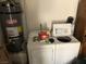 Laundry room featuring washer, dryer, and water heater at 308 Sunbeam Dr, Las Vegas, NV 89107