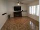 Bright living room boasts a fireplace and shuttered windows, creating a cozy and inviting atmosphere at 308 Sunbeam Dr, Las Vegas, NV 89107