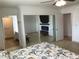 Inviting primary bedroom with mirrored closet doors, leading to a bathroom and additional closet space at 308 Sunbeam Dr, Las Vegas, NV 89107