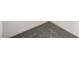 Corner view showcasing plush gray carpet flooring with white baseboards at 3240 Avernus Ave, Henderson, NV 89044