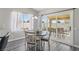 The dining area features a round table and access to the outdoor patio at 3538 Canter Dr, North Las Vegas, NV 89032