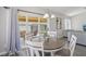 Cozy dining area offers views and flows into the living room at 3538 Canter Dr, North Las Vegas, NV 89032