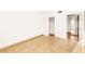 Vacant bedroom with tile floor, closet, and open doorway at 3668 Villa Knolls East Dr, Las Vegas, NV 89120