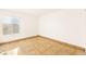 Empty bedroom with tile flooring, a window for natural light, ready for customization at 3668 Villa Knolls East Dr, Las Vegas, NV 89120