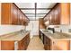 Functional kitchen showcasing cabinetry, granite countertops, and modern appliances at 3668 Villa Knolls East Dr, Las Vegas, NV 89120