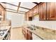 Bright, functional kitchen featuring plenty of counter space and connection to the outside at 3668 Villa Knolls East Dr, Las Vegas, NV 89120