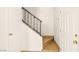 Simple staircase with tile steps and a black metal railing leading to the upper floor at 3668 Villa Knolls East Dr, Las Vegas, NV 89120