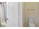 Small bathroom featuring a toilet, shower with curtain and doorway at 4020 Smokey Fog Ave # 3, North Las Vegas, NV 89081