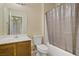 Bright bathroom featuring a shower-tub combo, single sink vanity, and neutral finishes at 4020 Smokey Fog Ave # 3, North Las Vegas, NV 89081