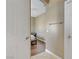 View of a bedroom from a doorway, showing wood floors and a neutral color scheme at 4020 Smokey Fog Ave # 3, North Las Vegas, NV 89081