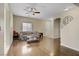 Bright living room featuring hard wood floors, neutral walls, and modern decor, creating a cozy atmosphere at 4020 Smokey Fog Ave # 3, North Las Vegas, NV 89081