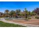 The community's playground and gazebo features picnic tables and beautiful, mature landscaping at 4020 Smokey Fog Ave # 3, North Las Vegas, NV 89081