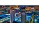Nighttime aerial view of the Las Vegas skyline featuring colorful city lights at 4381 W Flamingo Rd # 8304, Las Vegas, NV 89103