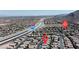 Community aerial view showing proximity to the 215 freeway and nearby amenities at 4435 Peaceful Harbor St, Las Vegas, NV 89129