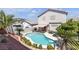 Home's backyard offers a pool, patio, and landscaped area perfect for entertaining at 4435 Peaceful Harbor St, Las Vegas, NV 89129