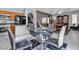 Breakfast nook with glass-top table, seating for four and natural light at 4435 Peaceful Harbor St, Las Vegas, NV 89129