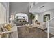 Bright and inviting living room features neutral tones, comfortable seating, and an open layout at 4435 Peaceful Harbor St, Las Vegas, NV 89129