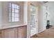 The bathroom includes a window, cabinets, shower with glass doors, and toilet at 4612 Standing Bluff Way, Las Vegas, NV 89130