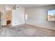 Spacious bedroom featuring neutral carpet and windows for natural light at 4612 Standing Bluff Way, Las Vegas, NV 89130